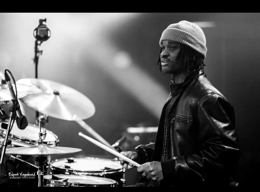 Michael Nyenty performing live on drums